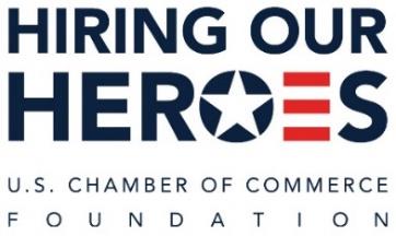 "Hiring our" is in navy blue text above "Heroes" which is centered on the graphic. The "O" has a white 5 pointed star in the center and the "E" is represented by 3 horizontal red rectangles in "Heroes". "U.S. Chamber of Commerce" is in smaller black text below "Heroes" followed by "Foundation" evenly spaced along the bottom of the graphic.